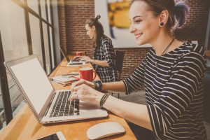 Hipster young couple freelancer using smart Laptop with smile ac